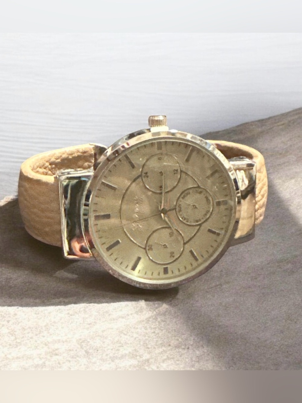 Silver-Tone Dial Watch with Beige Leather Strap
470